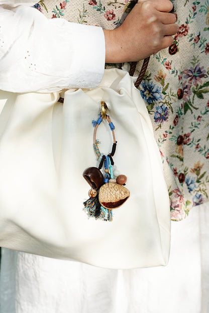 "The Azure Spirit" - Natural Nut Bag Charm with Boho Blue Tassel & Wrapped Loop